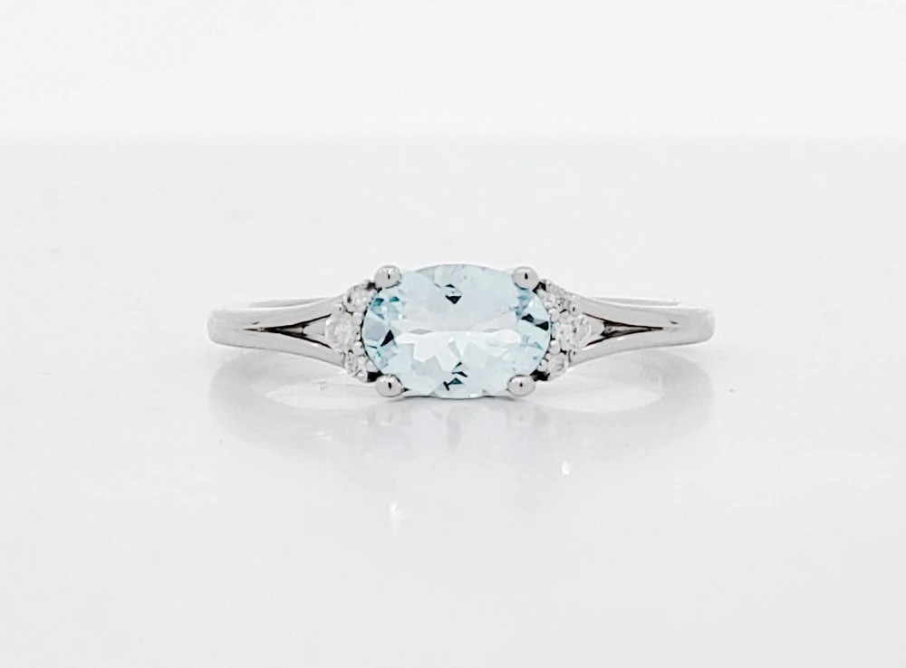 10K White Gold 5x7mm Oval Cut Aquamarine and 0.05cttw Diamond Ring, size 7