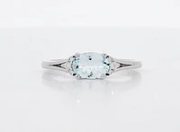 10K White Gold 5x7mm Oval Cut Aquamarine and 0.05cttw Diamond Ring, size 7