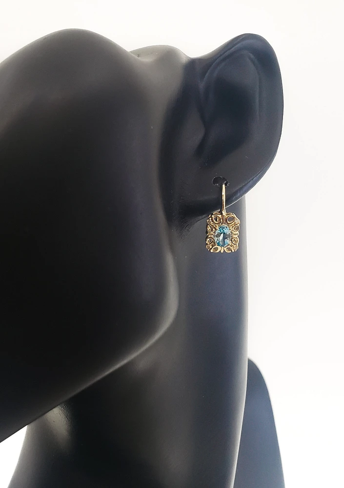 10K Yellow Gold 6x4mm Oval Cut Swiss Blue Topaz and 0.045cttw Diamond Dangle Earrings