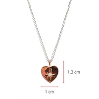 10K Rose & White Gold 0.027cttw Canadian Diamond Heart Pendant, 18"