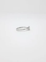 14K White Gold 0.30cttw Oval Cut Diamond Halo Engagement Ring, size 6.5
