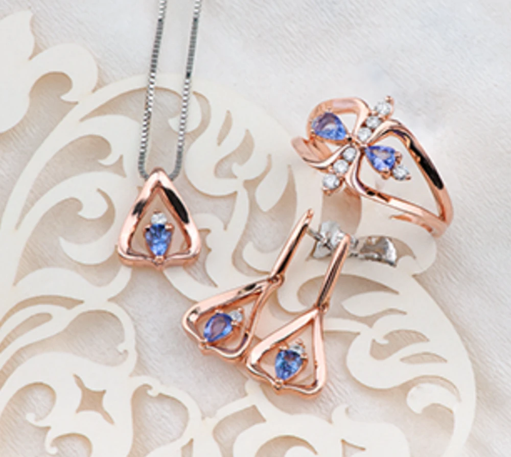 14K Rose Gold Genuine Pear Shape Tanzanite and 0.18cttw Canadian Diamond Ring, 6.5