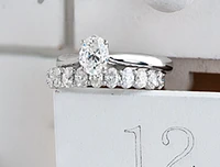 18K White Gold & Palladium Alloy (hypoallergenic) 0.73cttw Oval Shape Canadian Diamond Engagement Ring