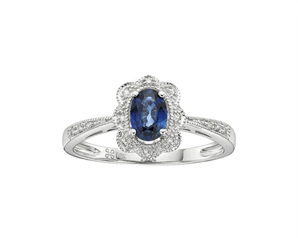 10K White Gold 6x4mm Oval Cut Sapphire and 0.055cttw Diamond Scallop Halo Ring - Size 7