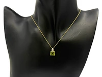 10K Yellow Gold 7mm Cushion Cut Peridot and 0.026cttw Diamond Pendant, 18"