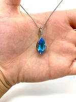 Blue Topaz and Diamond Pendant