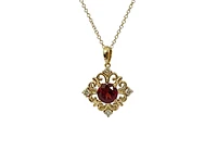 10K Yellow Gold 5mm Round Cut Garnet and 0.09cttw Diamond Pendant - 18 inches