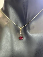 10K Yellow Gold 0.02 cttw Diamond and Garnet Pendant, 18"