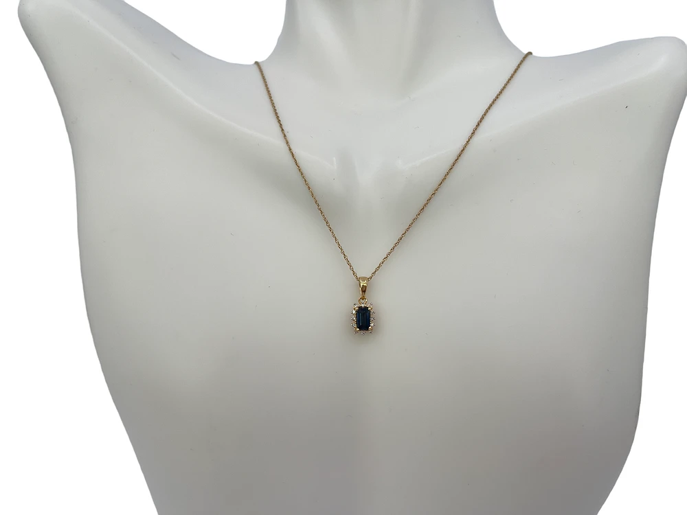 10K Yellow Gold 6x4mm Emerald Cut Sapphire and 0.04cttw Diamond Pendant, 18"
