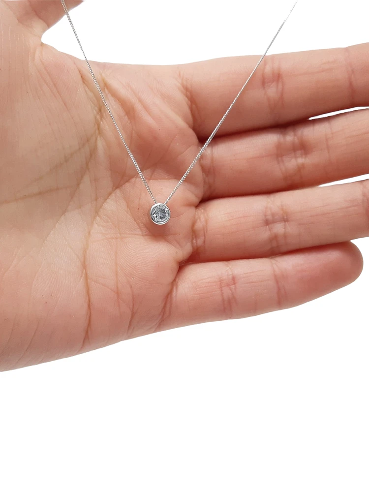 10K White Gold 0.20cttw Bezel Set Diamond Pendant, 18"