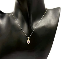 10K Yellow Gold 0.33cttw Genuine Amethyst and 0.08cttw Diamond Halo Pendant, 18"