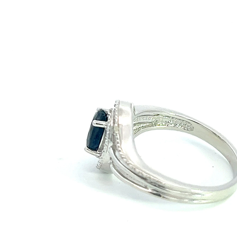 925 Sterling Silver 7 x 5mm Blue Sapphire and 0.03cttw Diamond Ring - Size 6