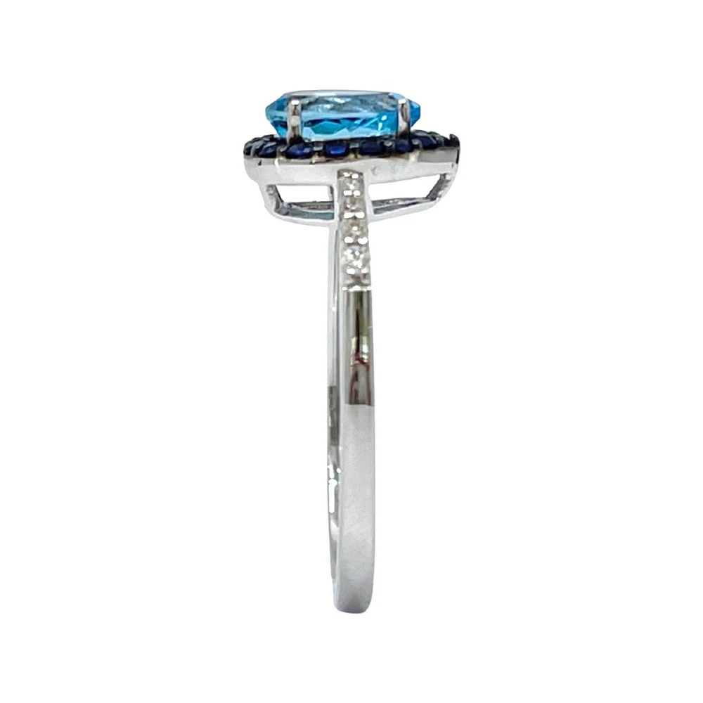 10K White Gold 7x5mm Pear Cut Sky Blue Topaz with Blue Sapphire Halo and 0.10cttw Diamond Ring - Size 7