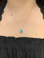 Blue Topaz and Diamond Pendant