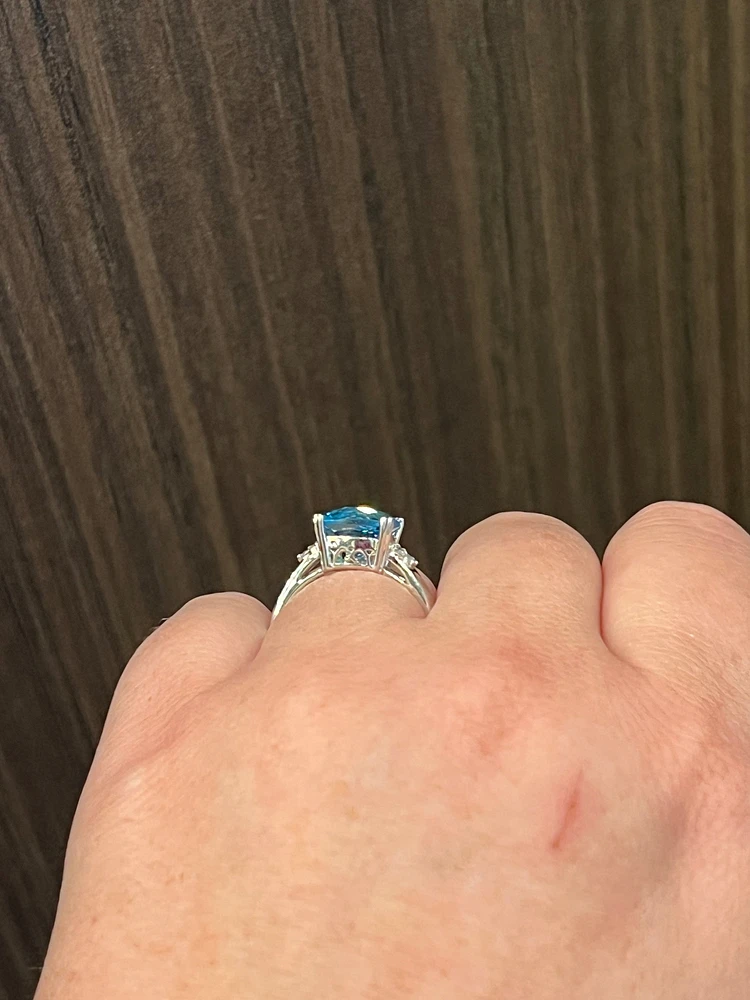 10K White Gold  9mm Blue Topaz and 0.10cttw Diamond Ring - Size 6