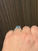 10K White Gold  9mm Blue Topaz and 0.10cttw Diamond Ring - Size 6