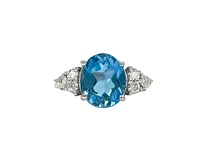 14K White Gold 10mm x 8mm Blue Topaz and 0.216cttw Canadian Diamond Ring