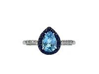 10K White Gold 7x5mm Pear Cut Sky Blue Topaz with Blue Sapphire Halo and 0.10cttw Diamond Ring - Size 7