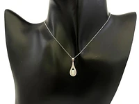 10K White Gold 6x4mm Oval Cut White Opal and 0.095cttw Diamond Pendant - 18 Inches