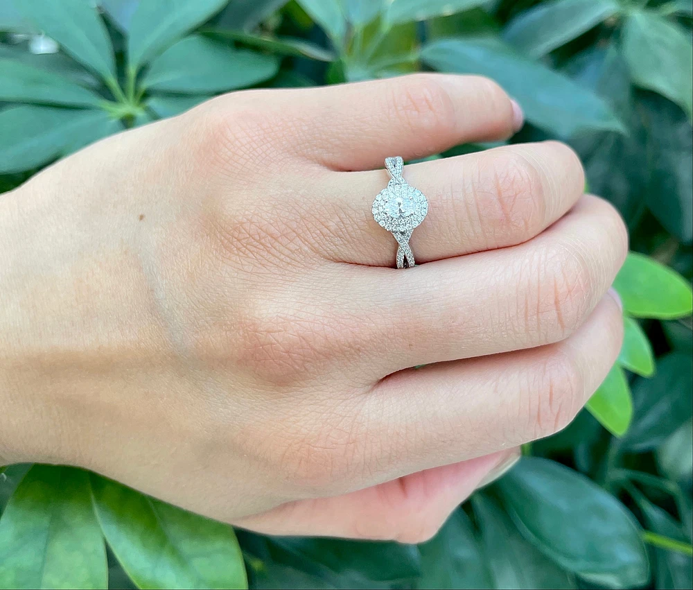 10K White Gold 0.24cttw Oval Cut Diamond Halo Engagement Ring, size 6.5