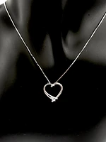 10K White Gold 0.017cttw Round Cut Diamond Pendant