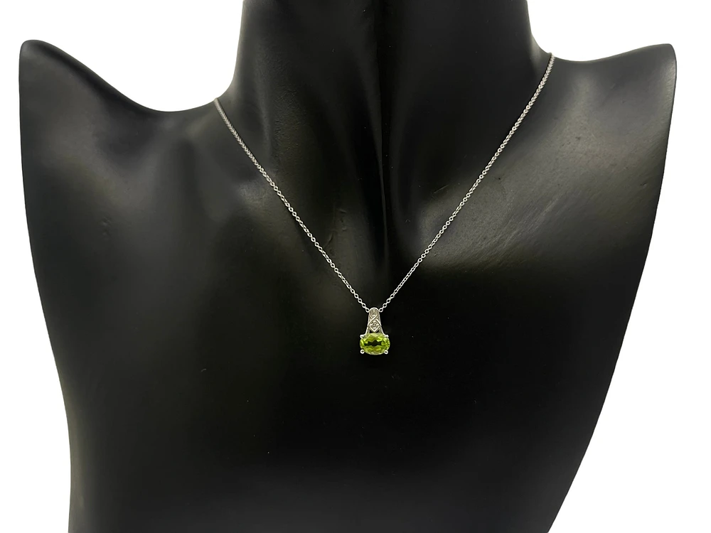 10K White Gold 7x5mm Oval Cut Peridot and 0.013cttw Diamond Pendant, 18"