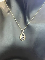 10K Yellow and White Gold 0.10 cttw Diamond Pulse Pendant, 18"