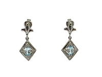 10K White Gold 0.60cttw Genuine Sky Blue Topaz & 0.03cttw Diamond Earrings