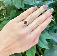 10K Yellow Gold 10 x 7mm Pear Shaped Garnet and 0.135cttw Diamond Ring