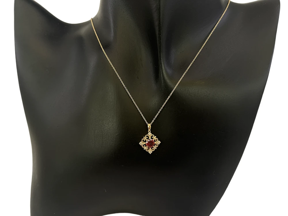 10K Yellow Gold 5mm Round Cut Garnet and 0.09cttw Diamond Pendant - 18 inches