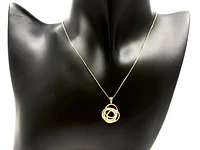 10K Two Tone Yellow and White Gold 0.18cttw Diamond Pendant, 18"