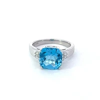 10K White Gold  9mm Blue Topaz and 0.10cttw Diamond Ring - Size 6