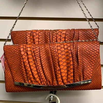 Shop Local Fashion: Unique Orange Snake Print Clutch
