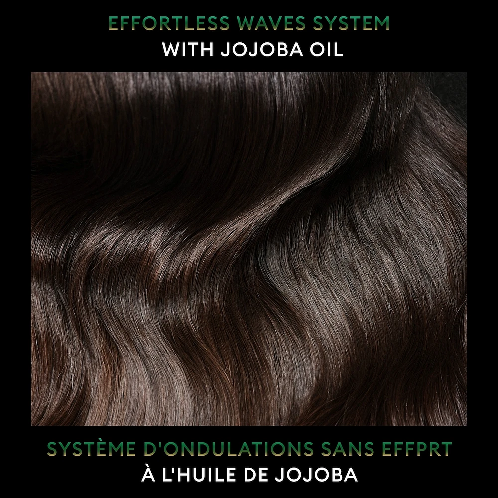 Revitalisant pour des cheveux hydratés et sans frisottis TRESemmé Effortless Waves + Oléo-Essence de Jojoba avec Technologie Pro Style™ 828 ml