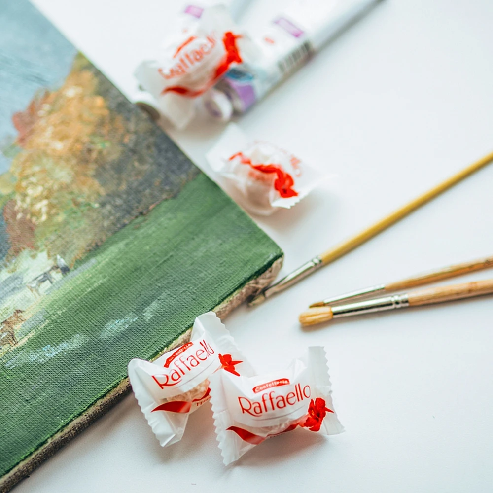 Sachet de spécialités à la noix de coco et à l’amande CONFETTERIA RAFFAELLO, 8 confiseries emballées individuellement