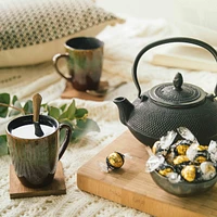 Un enrobage au chocolat 70% cacao fourré de fondant onctueux extra noir