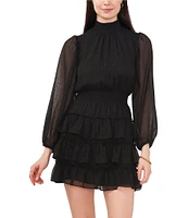 1. STATE Smock Mock Neck Sheer Long Sleeve Tiered Mini Dress