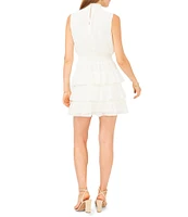 1. STATE Smocked Mock Neck Sleeveless Ruffle Tiered Mini Dress