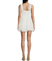 B. Darlin Flocked Dot Mesh Sweetheart Neck Shirred Bustier Mini Dress