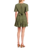 B. Darlin Flutter Short-Sleeve Deep V-Neck Ruffled Tier Fit-And-Flare Dress