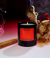 Boy Smells Red Hot Candle