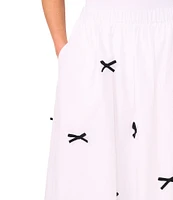 CeCe Bow Detail Pull On Midi A-Line Skirt