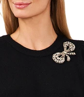 CeCe Crew Neck Long Sleeve Rhinestone Bow Jersey Knit Sweater