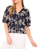 CeCe V-Neck Short Puff Sleeve Embroidered Tie Front Top