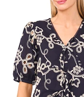 CeCe V-Neck Short Puff Sleeve Embroidered Tie Front Top