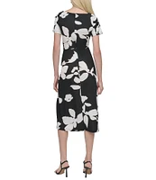 DKNY by Donna Karan Matte Jersey Floral Print Boat Neck Short Sleeve Twist Front Sheath Midi Dress