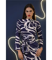 Donna Morgan Printed High Mock Neck Long Sleeve Tie Waist Draped Asymmetrical Hemline Dress