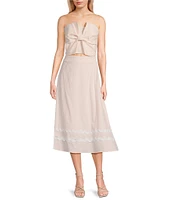 Evolutionary Strapless Bow Top