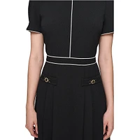 KARL LAGERFELD PARIS Scuba Crepe Collar Neck Short Sleeve Gold Hardware Contrast Trim Pleated Mini Dress