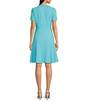 Maggy London Scuba Crepe Asymmetrical Crew Neck Short Sleeve A-Line Mini Dress